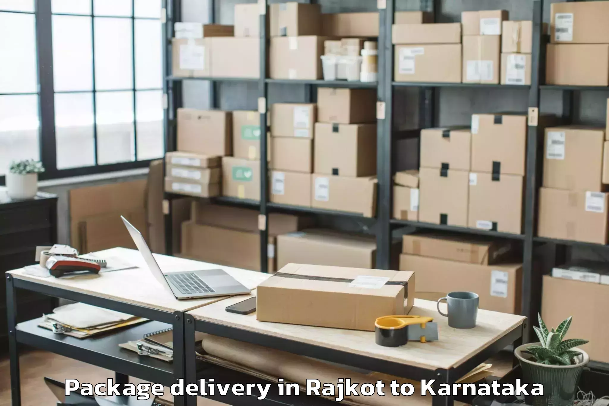 Leading Rajkot to Holalkere Rural Package Delivery Provider